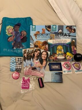 Damsel Defense Teal Drawstring Bag with Kids' Activity Books and Accessories